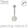 Piercing nombril titane avec howlite naturelle de 6mm.