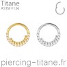 Clicker titane cristaux et microbilles internes à l'anneau